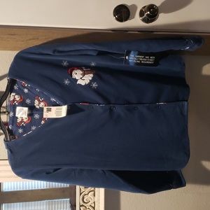 Pajama top. Christmas hat pup and snow flakes on left chest.